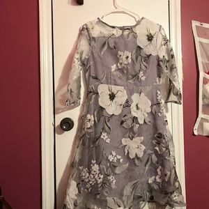 I am selling this beautiful lavender flower dress